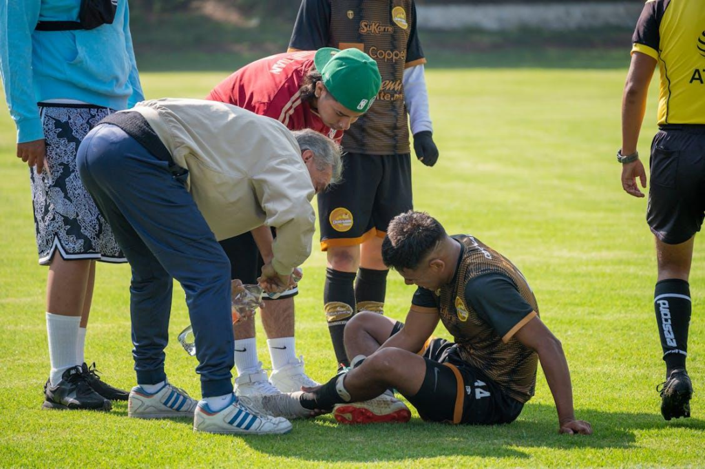 An athlete with an injury on the field